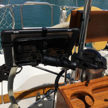 Load image into Gallery viewer, Tidal Mounts Clamp on boat helm mount secured to helm grab bar
